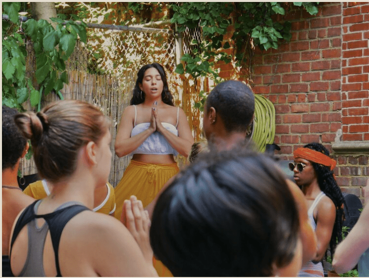 Danielle-Olivarez Founder of Highlites leading a meditation session