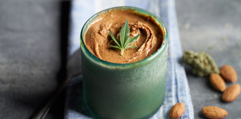 almond-butter with cannabis leaf on top cannabis-infused nut butters